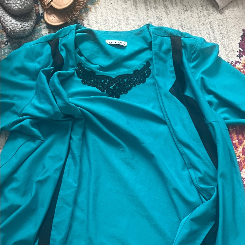 Elegant Teal Blazer with Black Accents
